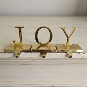 JOY Christmas Stocking Hangers Gold Tone Metal Mantle Hooks Set of 3 Holiday Vtg